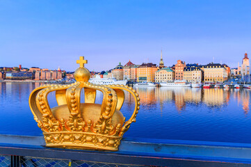 Stockholm, Sweden. Gilded crown on the Skeppsholm Bridge. Scandinavia.