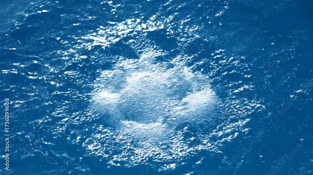 Poster a top-down perspective showcases a powerful slow motion water splash, creating a complex fractal pat