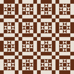 Pattern created from brown and beige squares, rectangles and triangles