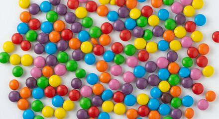 Fototapeta premium Colorful Candy Coated Chocolate Candies Scattered sweets