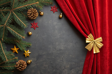Velvet red stage curtains and a backdrop adorned with golden ribbons and stars. Luxury. Event. Party. Sophistication.