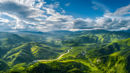 Naklejka premium Green rolling hills and winding road