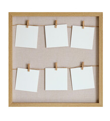 Minimalist wooden frame mood board with six blank square photo cards held by clothespins.