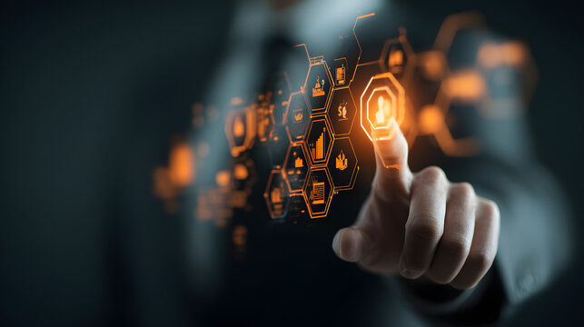 The digital interface features interconnected glowing icons and is being engaged by a finger pressing a circular button, hinting at technological progress and futuristic connectivity