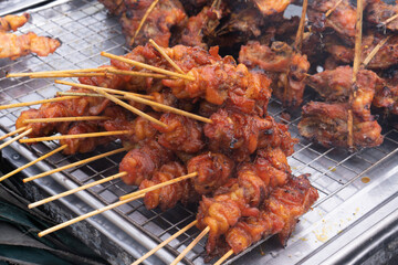 Marinated meat with sauce and spices Many flavorings Bamboo skewers grilled with charcoal