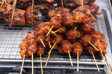 Marinated meat with sauce and spices Many flavorings Bamboo skewers grilled with charcoal
