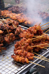 Marinated meat with sauce and spices Many flavorings Bamboo skewers grilled with charcoal
