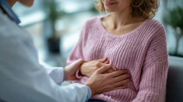 Healthcare professional examining patientâs stomach gently, warm daylight entering clinical space, sense of trust and wellness conveyed
