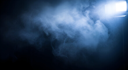 Fototapeta premium Blue Smoke Illuminated by Spotlight dark