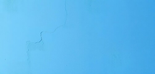 Fototapeta premium Smooth, textured blue concrete wall, varying shades, aged, teal