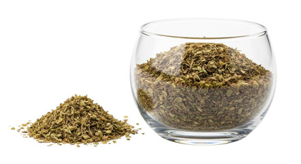 Isolated oregano in a glass container and in a heap beside it, for cooking purposes