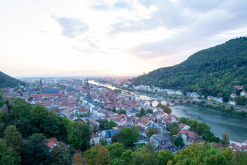 Sunset over a picturesque town by the river