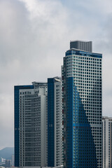 Fototapeta premium skyscrapers against cloudy sky