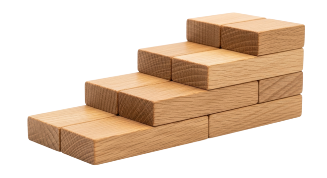 Isolated wood blocks arranged as stairs to represent concept of progression upward toward goal