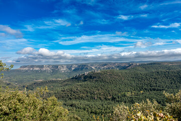 Fototapeta premium Spectacular Panoramic Landscape of Els Motllats Mountains Tarragona Spain Forested Cliffs and Natural Heritage Site