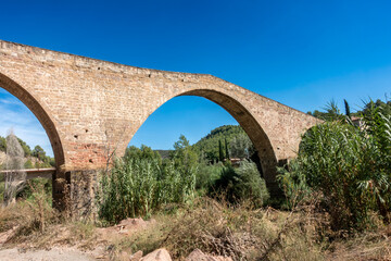 Ancient Gothic Pont Vell Bridge Castellbell i el Vilar Barcelona Spain 15th Century Stone Arch Detail and Medieval Engineering