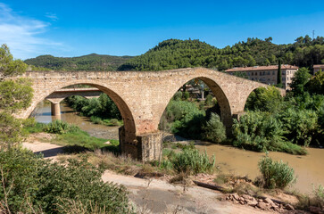 Ancient Gothic Pont Vell Bridge Castellbell i el Vilar Barcelona Spain 15th Century Stone Arch Structure and Civil Engineering Monument