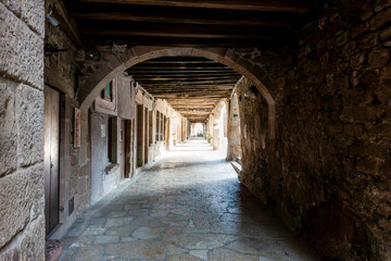 Ancient Medieval Architecture Santa Pau Village Gerona Spain 13th Century Stone Arcades Tunnel and Old Town Walkway