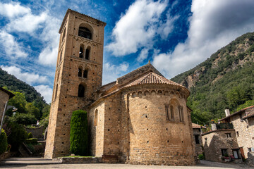 Historic Romanesque Sant Cristòfor de Beget Church Gerona Spain 12th Century Medieval Bell Tower Apse and Mountain Backdrop