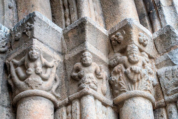 Mythical beasts and figures carved on the medieval stone capitals of the Santa Maria Cathedral in La Seu d'Urgell, a masterpiece of Romanesque sculpture. Catalonia, Spain