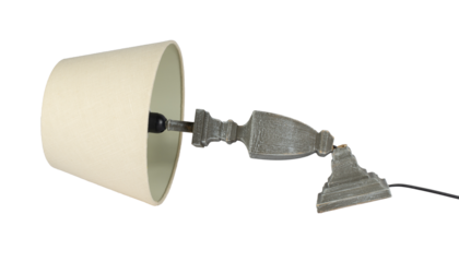 Damaged elegant lamp with a broken base, isolated. The image conveys a sense of malfunction, disuse, or a need for repair.