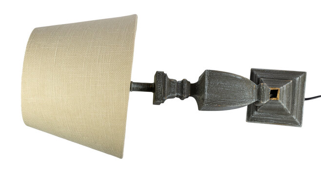 Damaged elegant lamp with a broken base, isolated. The image conveys a sense of malfunction, disuse, or a need for repair.