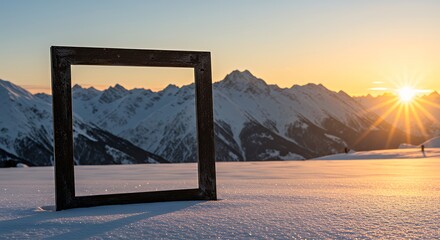 Wooden Square Frame on Snowy Mountain Landscape at Sunset
