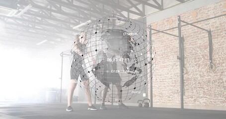 Workout partners hinging and swinging kettlebells generating 3D globe overlay showing fitness data - Powered by Adobe