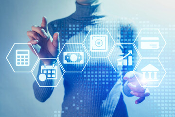 A woman is holding a cell phone and touching a screen with a blue background, business concept