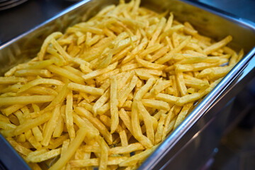 French fries serving ready at buffet catering