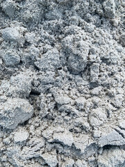 Fototapeta premium Texture of wet gray sand, background, texture