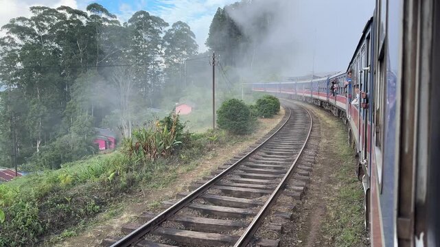 Ella, Sri Lanka - August 4, 2025: Side view on a Sri Lankan train tour between Ella and Kandy, Sri Lanka.