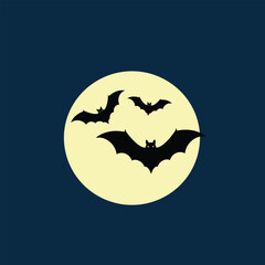 Spooky Halloween night scene with black flying bats silhouetted against a bright full moon