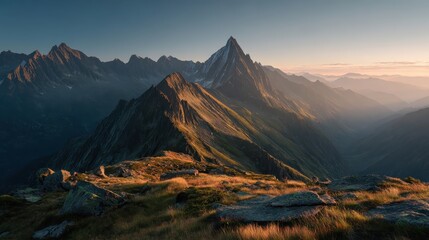 Majestic Mountain Landscape at Sunrise with Dramatic Peaks and Valleys