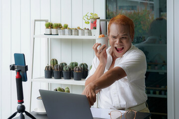 LGBT people selling products by live streaming and recording videos with smartphone tripods, showcasing lifestyle, technology, and social media connections.