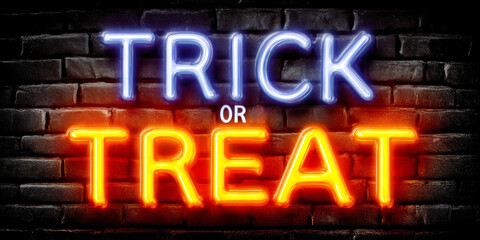 Bright Neon Sign Reading Trick Or Treat Flickering Against Dark Brick Wall