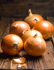 Fresh onions on a wooden board