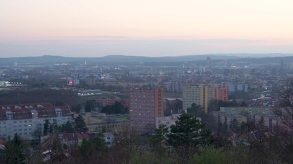 Brno, Czech Republic - March 29, 2025: View of the city from above at night. Evening city panorama. Špilberk Castle