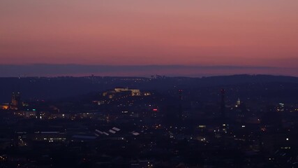 Brno, Czech Republic - March 29, 2025: View of the city from above at night. Evening city panorama. Špilberk Castle