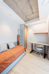 Luxury Home Young Adult Children Room Interior. Hardwood Floor, Couch Sofa, Wooden Door, Wardrobe Closet and Table With Chair. Brigh LED Light.