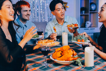 Diversity, dinner and group of people toast celebration together at party. Friends, happy and celebrate with food, wine and friendship for love, support and cheers champagne at business function