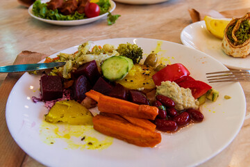 Delicious roasted vegetables served on a plate, showcasing vibrant colors and appetizing texture.