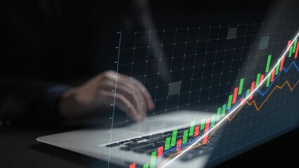 A businessman studies financial data on a laptop, surrounded by vibrant graphs showing growth trends. This image illustrates data analysis and investment strategies in a modern workspace. Copula