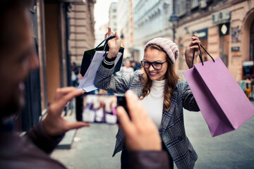 Happy woman shopping in city