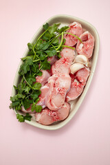 Fresh raw rabbit meat on dish