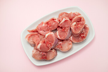 Fresh raw rabbit meat on dish