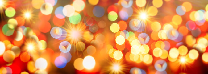 Abstract bokeh background with vibrant and colorful lights create a festive blurred background with a glowing circle pattern perfect for celebrations, Christmas lights