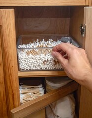 Cotton swabs in a cabinet