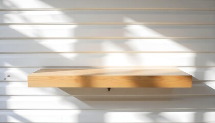 A wooden shelf on a wooden wall with sunlight casting shadows , simple and clean design, minimalist aesthetic, bright and airy atmosphere.