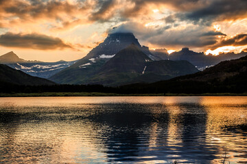 Sunset Reflections of Mountains of Glacier above Swiftcurrent Lake, Many Glacier, Glacier National Park, Montana